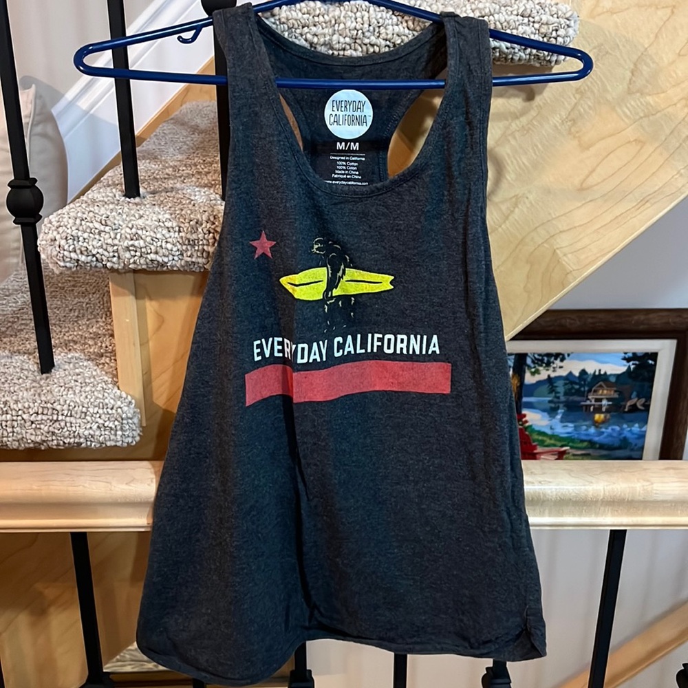 Cotton tank top with a bear holding a surfboard